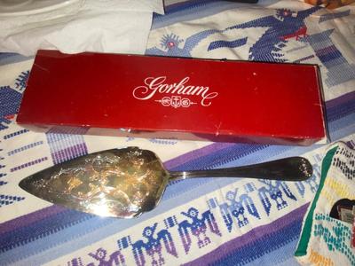 LONGBERGER BASKET , COPPER MOLD, IRON MOOSE CANDLE HOLDER, 8 DINNER PLATES, TABLE CLOTH WITH LIKE OVEN MIT, GORHAM KNIFE & PIE SERVER...