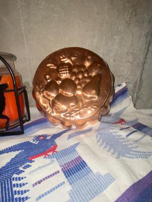 LONGBERGER BASKET , COPPER MOLD, IRON MOOSE CANDLE HOLDER, 8 DINNER PLATES, TABLE CLOTH WITH LIKE OVEN MIT, GORHAM KNIFE & PIE SERVER...