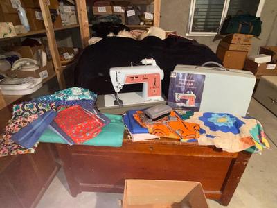 SINGER, SEWING MACHINE IN A VARIETY. OF VINTAGE MATERIAL