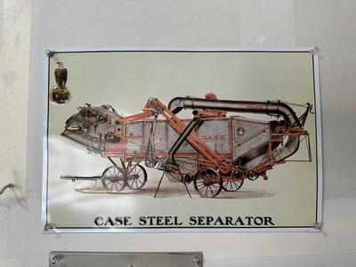 2 TIN SIGNS WITH RAISED ILLUSTRATIONS