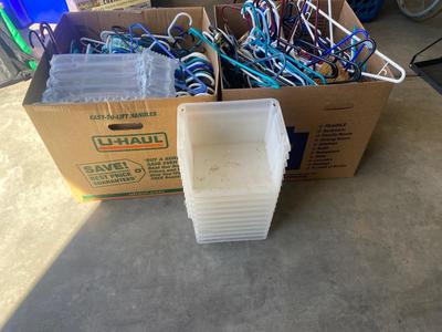 A TON OF HANGERS, CARDBOARD BARREL, AND ORGANIZING TOTES