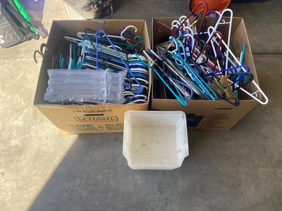 A TON OF HANGERS, CARDBOARD BARREL, AND ORGANIZING TOTES