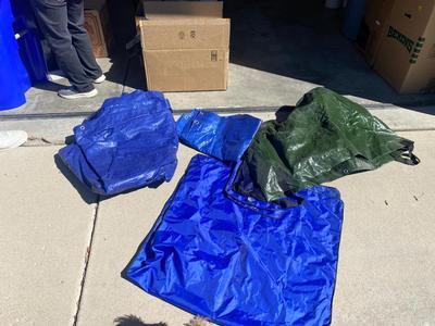 WEATHER WINDSHIELD COVER, 2 BLUE TARPS AND 1 BIG GREEN TARP BAG