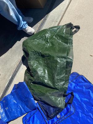 WEATHER WINDSHIELD COVER, 2 BLUE TARPS AND 1 BIG GREEN TARP BAG
