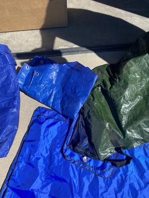 WEATHER WINDSHIELD COVER, 2 BLUE TARPS AND 1 BIG GREEN TARP BAG