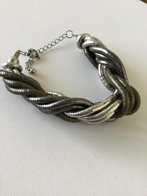 Beautiful twist unmarked statement bracelet