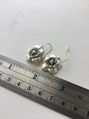 Unmarked flower dangle earrings