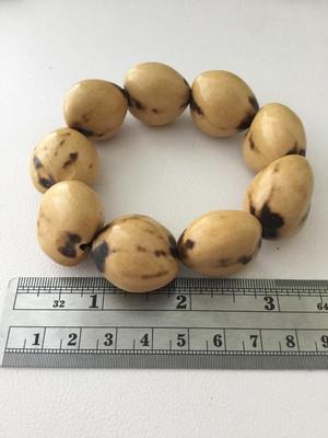 Light brown wooden type stretchy fashion bracelet