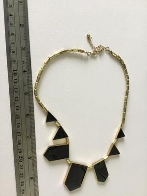 Gold tone plastic statement necklace