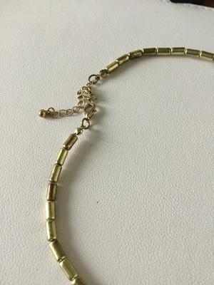 Gold tone plastic statement necklace