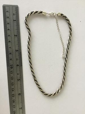 Beautiful twist silver tone necklace