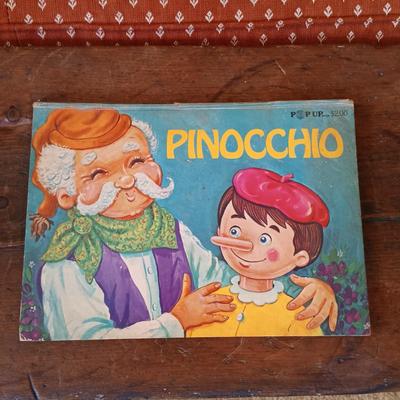 LOT 8: Large Resin Pinocchio Figurine w/ Resin Mickey Mouse Staue and Set of 3 Fairytale Books