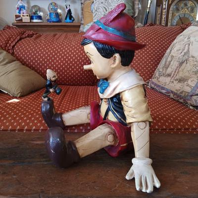 LOT 8: Large Resin Pinocchio Figurine w/ Resin Mickey Mouse Staue and Set of 3 Fairytale Books