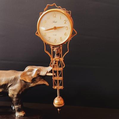 LOT 10: Fuji Elephant 8-Day Mystery Swinging Clock