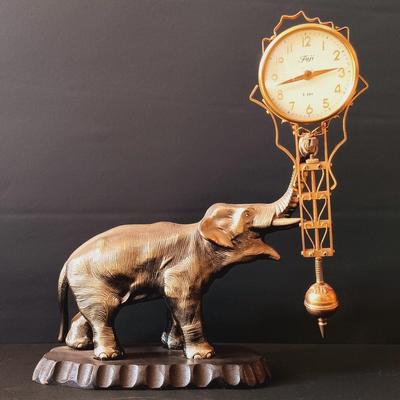 LOT 10: Fuji Elephant 8-Day Mystery Swinging Clock