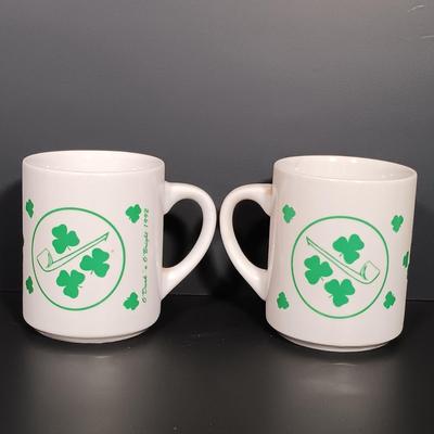 LOT 19: Lefton Shamrock Music Box Teapot and Teacup with O'Dunk 'n' O'Bright Placemats and Mugs & More