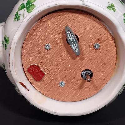 LOT 19: Lefton Shamrock Music Box Teapot and Teacup with O'Dunk 'n' O'Bright Placemats and Mugs & More