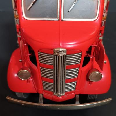 LOT 27: Danbury Mint Coca-Cola 1928 and 1938 Delivery Trucks