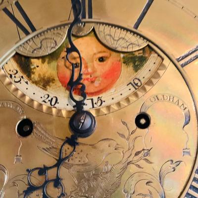 LOT 38: Antique Wooden Grandfather Clock with Golden/Brass Face and Golden/Brass Eagle Finials