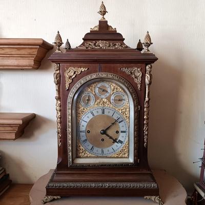 LOT 173: Antique Wood and Brass Bracket Clock