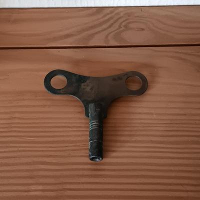 LOT 173: Antique Wood and Brass Bracket Clock