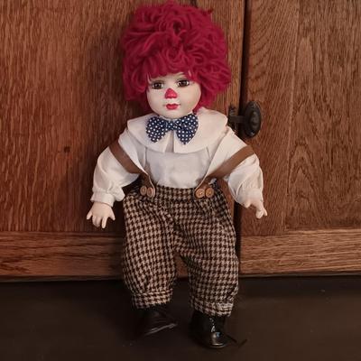 LOT 180: Cardinal Musical Clown Doll, Celluloid and Cloth Clown Doll, Frankel Porcelain Clown & More