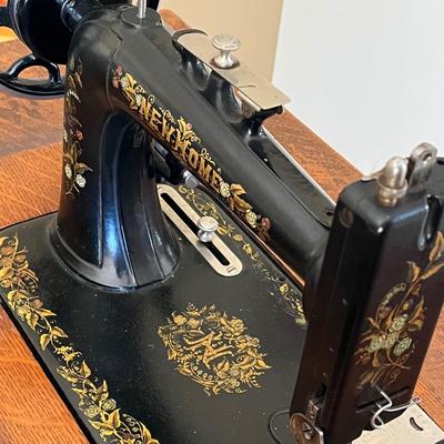 LOT 72F: Antique New Home Sewing Machine w/ Table and Cover