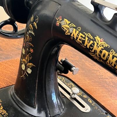 LOT 72F: Antique New Home Sewing Machine w/ Table and Cover