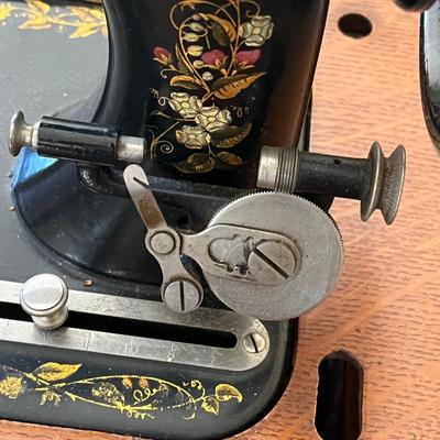 LOT 72F: Antique New Home Sewing Machine w/ Table and Cover