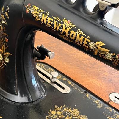 LOT 72F: Antique New Home Sewing Machine w/ Table and Cover