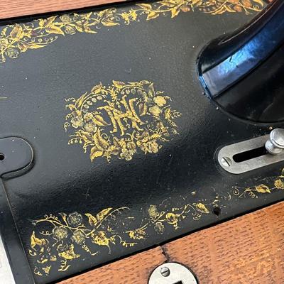 LOT 72F: Antique New Home Sewing Machine w/ Table and Cover