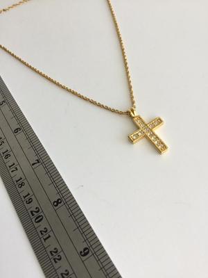 Gold tone unmarked cross necklace