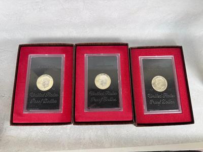 Coins: Proof Eisenhower Silver Dollars in Display Case (qty: 3)