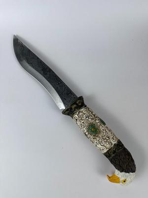 Exquisitely detailed carved 13” American eagle knife with 8” blade with antler stand