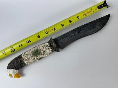 Exquisitely detailed carved 13” American eagle knife with 8” blade with antler stand