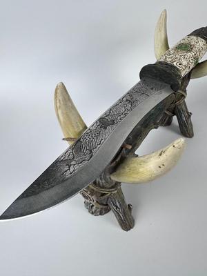 Exquisitely detailed carved 13” American eagle knife with 8” blade with antler stand