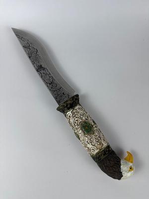 Exquisitely detailed carved 13” American eagle knife with 8” blade with antler stand
