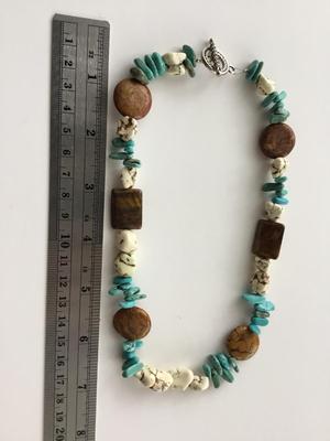 Beautiful statement stone type necklace with matching earrings