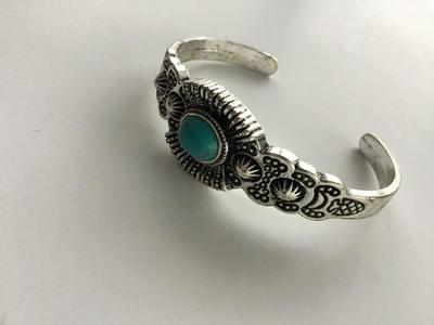 Silver tone blue stone type cuff bracelet