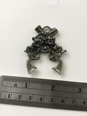 Beautiful unmarked gun and roses necklace pendant