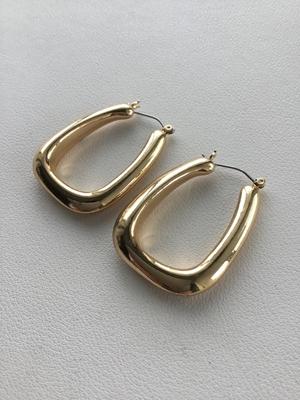 Gold tone statements earrings