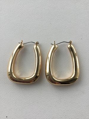 Gold tone statements earrings