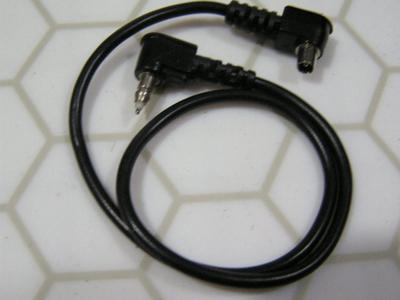 Nikon hot shoe flash sync adapter #AS-15. For off camera flash