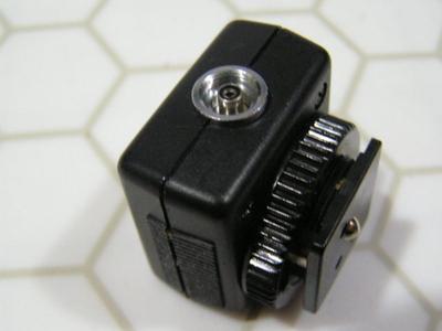 Nikon hot shoe flash sync adapter #AS-15. For off camera flash