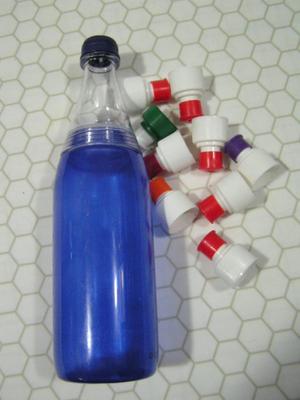 Campers & hikers water bottle and some nipple style bottle caps.