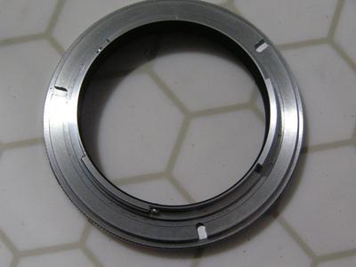 Nikon macro adapter ring set (aka: lens reversing ring set). PNs: BR-2A & BR-5,