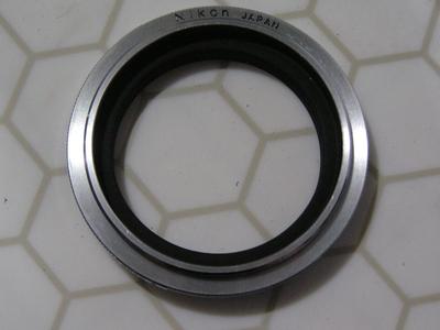 Nikon macro adapter ring set (aka: lens reversing ring set). PNs: BR-2A & BR-5,