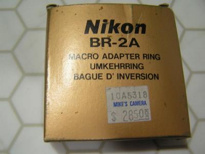 Nikon macro adapter ring set (aka: lens reversing ring set). PNs: BR-2A & BR-5,