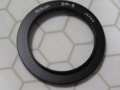 Nikon macro adapter ring set (aka: lens reversing ring set). PNs: BR-2A & BR-5,