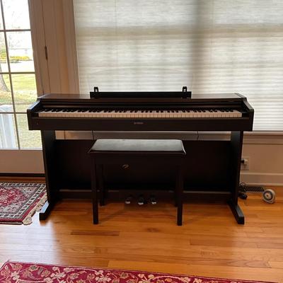 L1200 Yamaha Electric Piano with Sheet Music